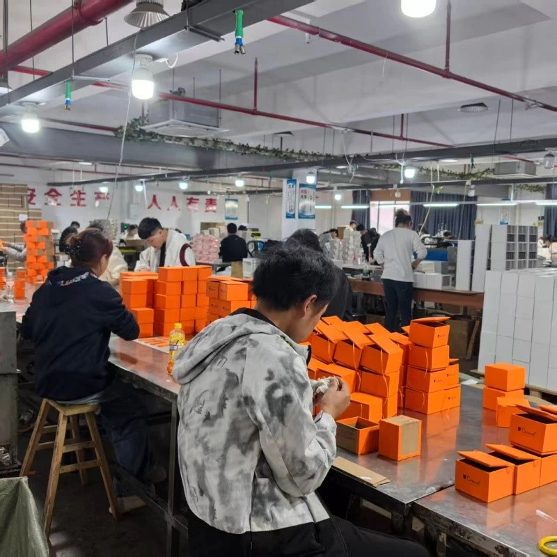 workers assembling custom jewelry boxes workers assembling custom jewelry boxes