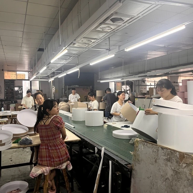workers assembling custom jewelry boxes workers assembling custom jewelry boxes