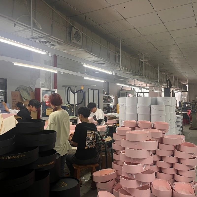 workers assembling custom jewelry boxes workers assembling custom jewelry boxes